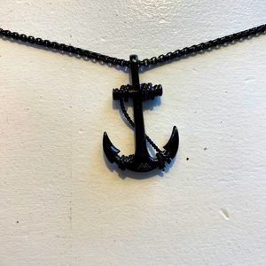 It’s a men’s necklace all black.